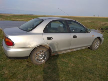 Mazda Familia 1.5 AT, 1996, битый, 293 000 км