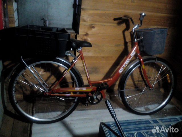 Велосипед с двумя съемными грузовыми корзинами