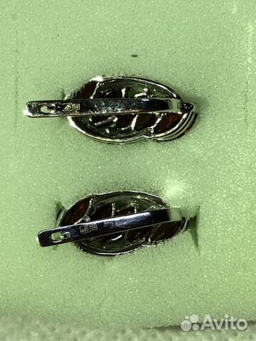 Золотые серьги и кольцо 750 пробы с гранатом Золотые серьги и кольцо 750 пробы с гранатом