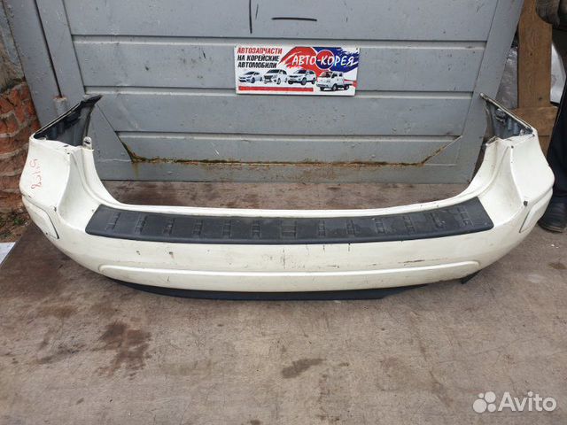 Бампер задний Kia Carens 2004-2010