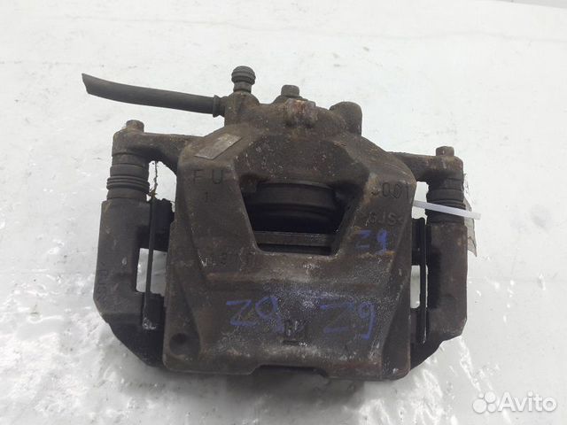 Суппорт тормозной передний правый Opel Astra