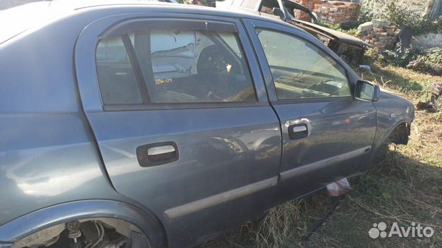 Дверь правая задняя Опель астра Джи