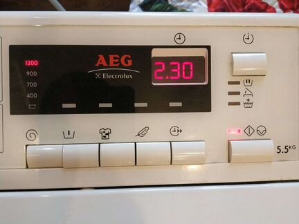 AEG с вертикальной загрузкой 5.5 кг 1200 об