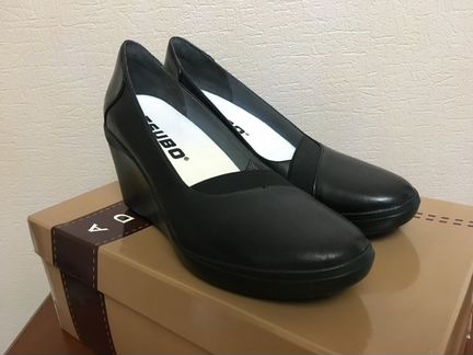 Новые кожаные туфли